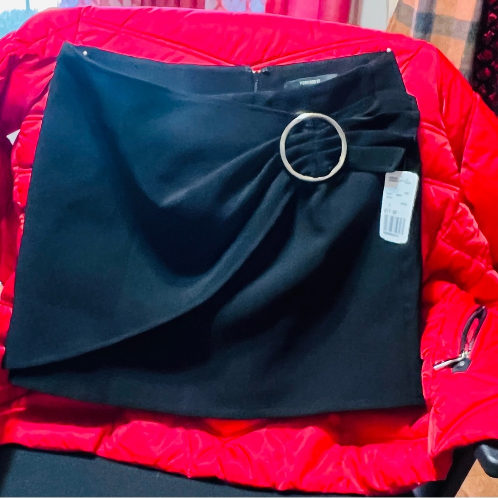 Mini skirt black w/ silver buckle. Large